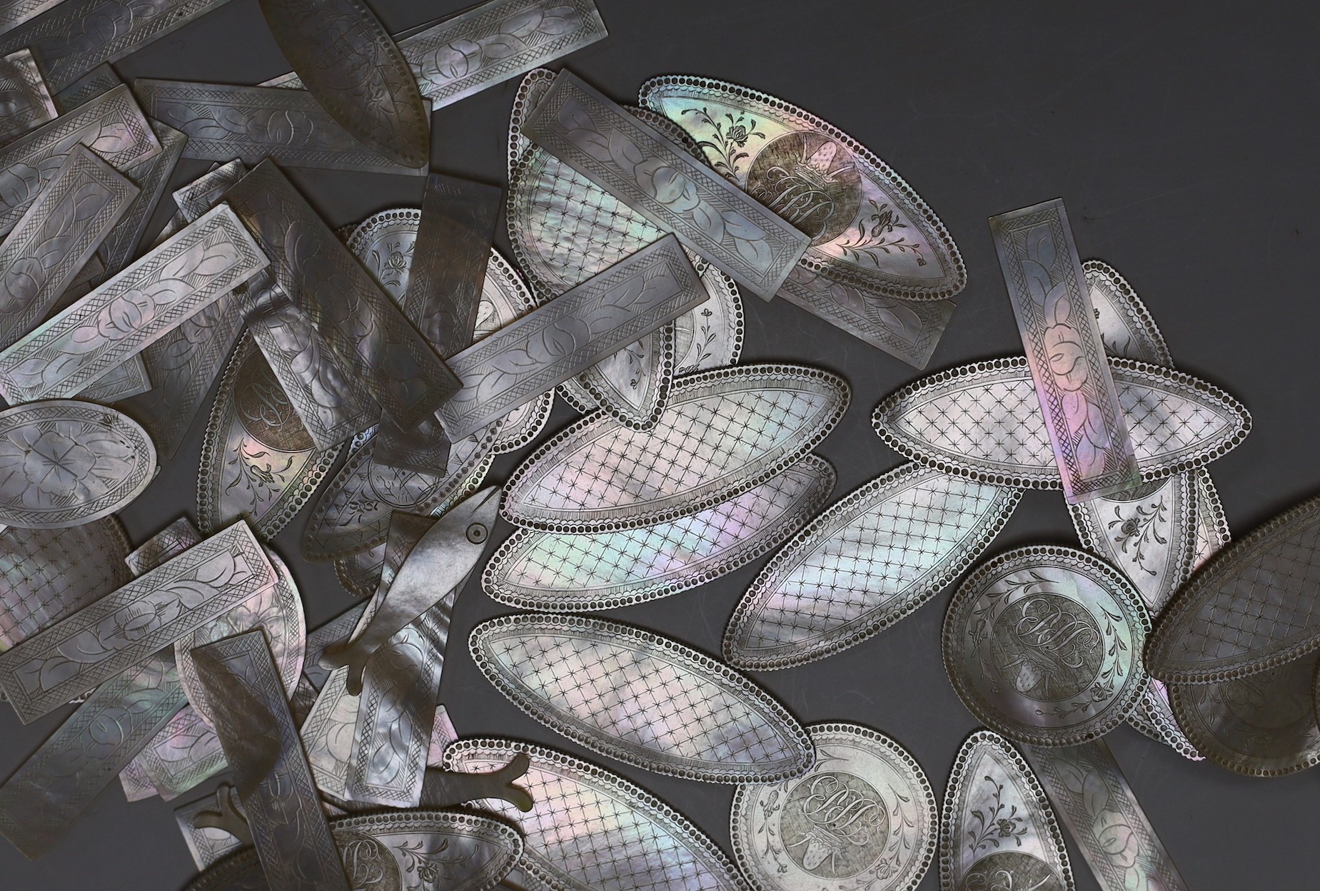 A box of Chinese mother of pearl gaming counters including crested examples with JRB monogram